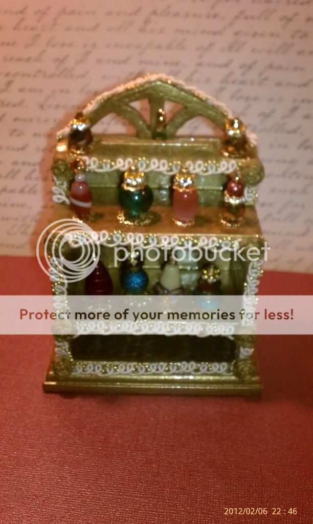 Up for auction is a new 112 OOAK Dollhouse Miniature Perfume Display 